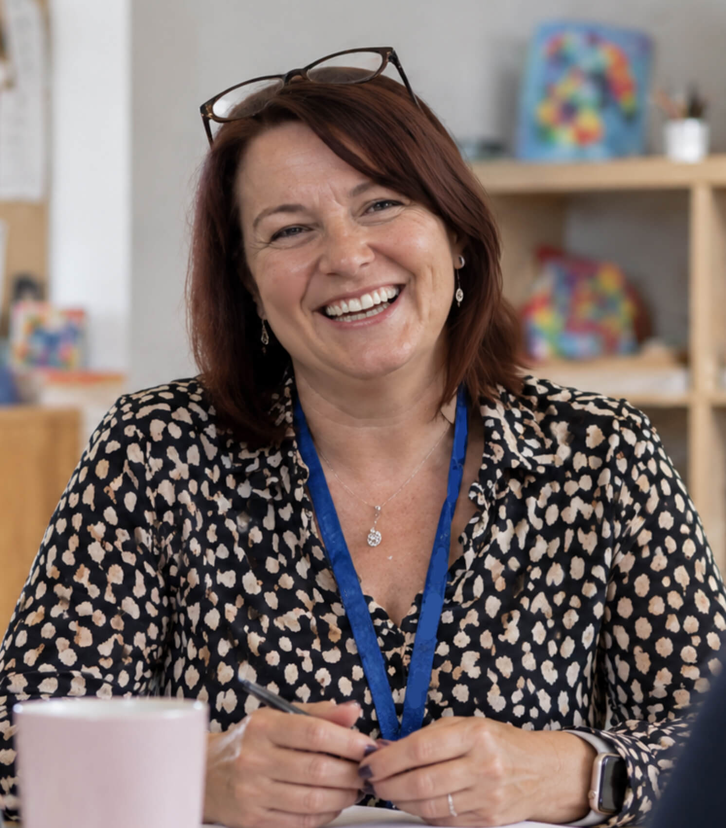 Nursery owner smiling